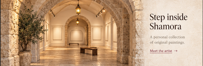 Shamora gallery interior with warm stone arches and the invitation to step inside.